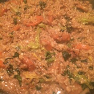 Rice cooked with carrots in a creamy peanut sauce
